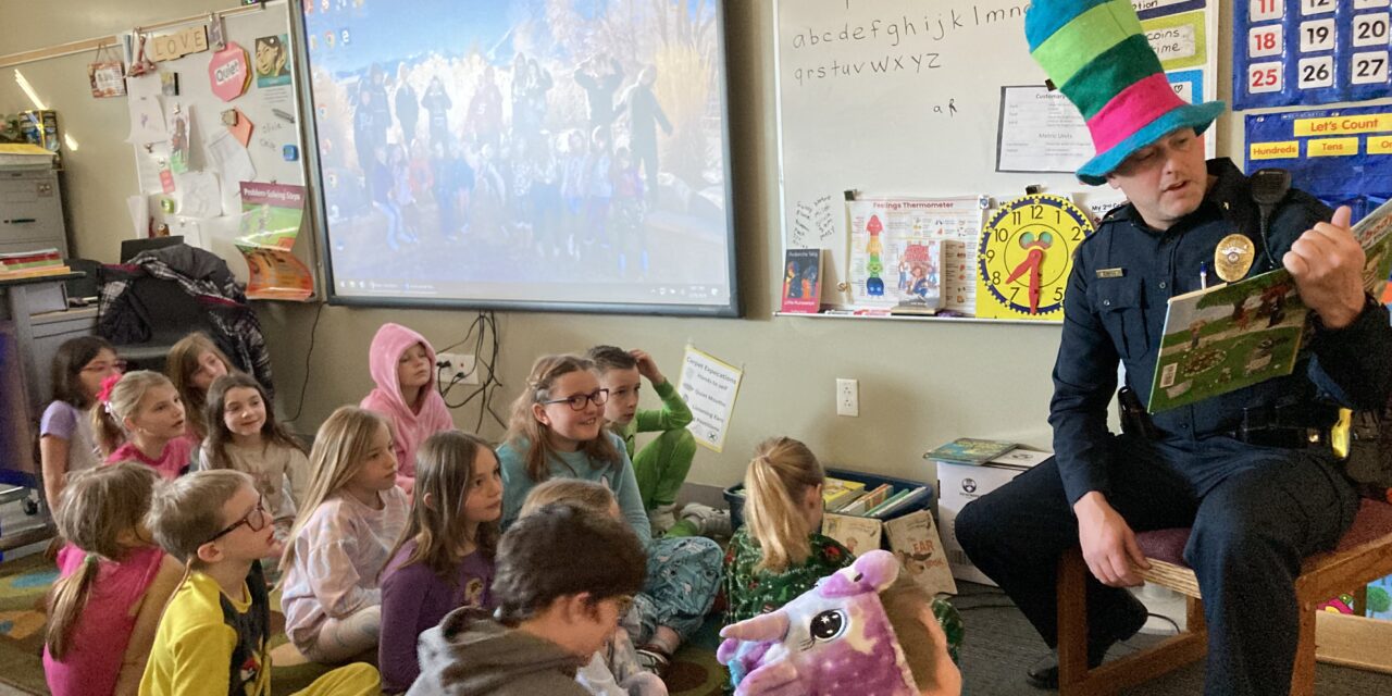 Longfellow Elementary School Does “Read with a Cop”